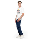 A man wearing a white T-shirt with the phrase 'The TABASCO THEATER' and a red chili pepper graphic, paired with blue jeans and white sneakers, standing against a white background.