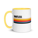 A white mug with a yellow handle, featuring the word 'SMARTLESS' and colored stripes in various shades.