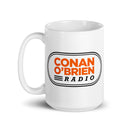 White mug featuring 'Conan O'Brien Radio' logo in orange and black design.