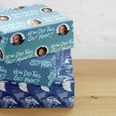 Stack of decorative boxes with 'How Did This Get Made' logo and images on a wooden surface against a white brick wall.