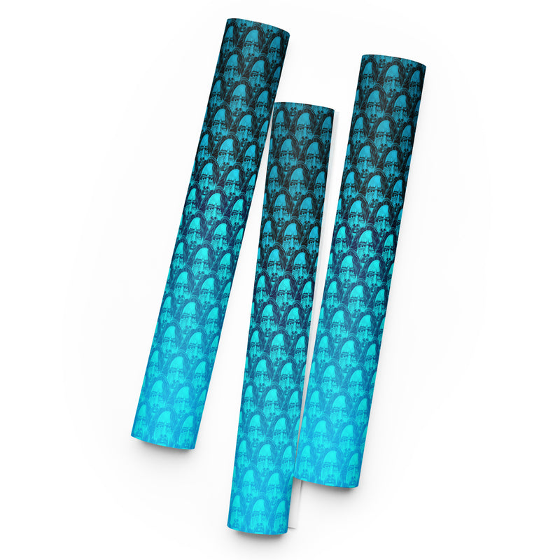 Three rolled textured wraps in shades of blue with a repeating pattern of faces, fading from dark to light.