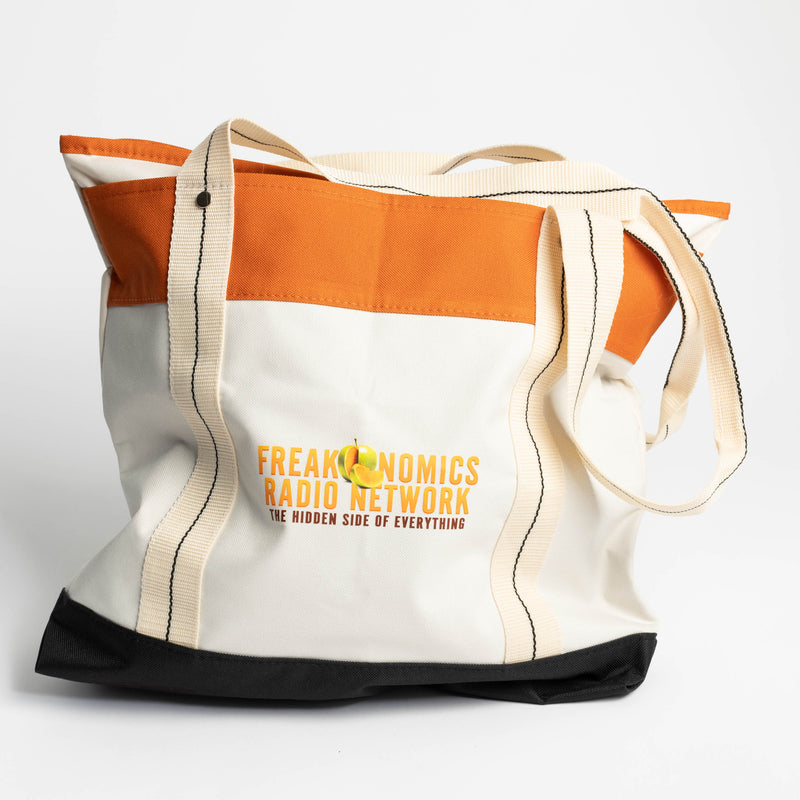 canvas tote bag with orange and black accents featuring 'Freakonomics Radio Network' logo