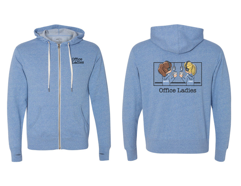Pale blue zip-hoodie with 'Office Ladies' logo on front and cartoon characters on the back holding mugs and microphones on the back.