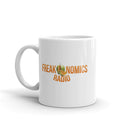 White mug with 'Freakonomics Radio Network' logo and fruit graphic.