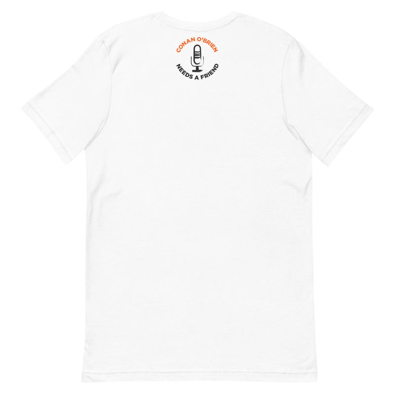 white t-shirt featuring the text 'Conan O'Brien Needs a Friend' with a microphone graphic on the back