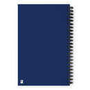 plain navy blue spiral notebook with a blank cover and black spiral binding