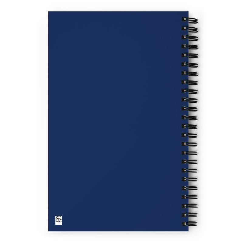 plain navy blue spiral notebook with a blank cover and black spiral binding