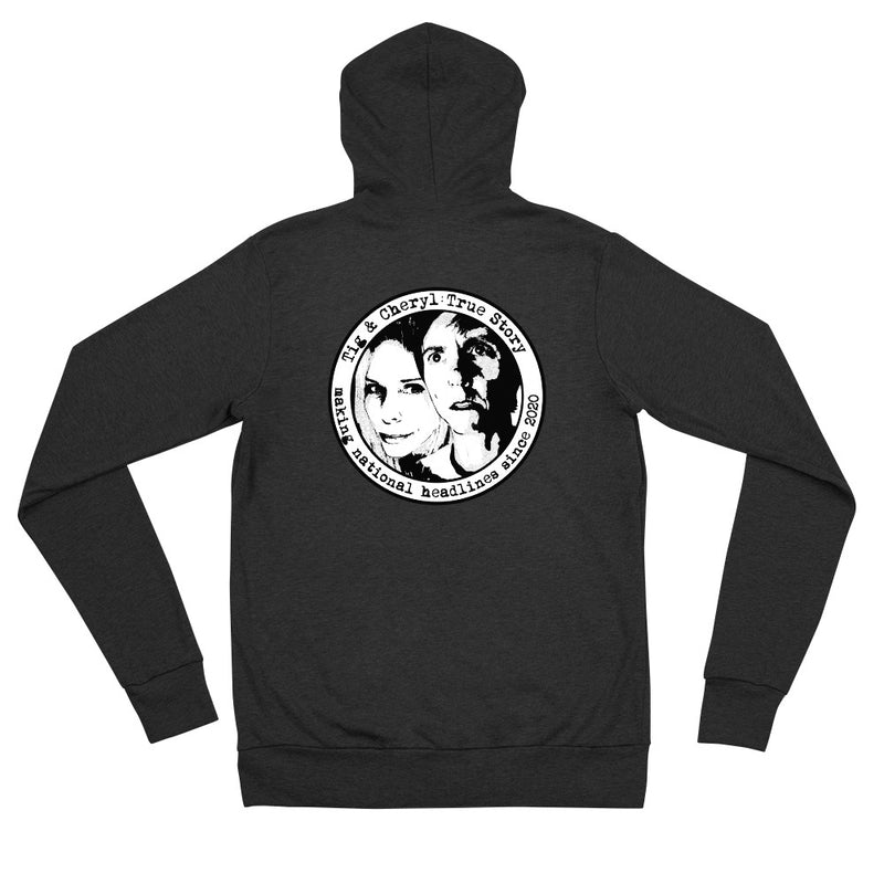 Backside of hoodie featuring white illustrations of two faces with the text 'Tig & Cheryl: True Story' and 'Making National Headlines Since 2020.'