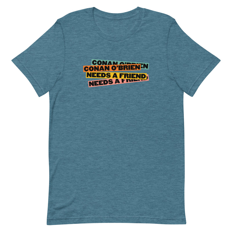 Blue shirt with orange, green, and blue stripes and text that reads 'Conan O'Brien Needs A Friend.'