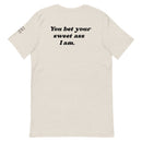 Backside of ivory t-shirt with black text reading 'You Bet Your Sweet Ass I Am.'