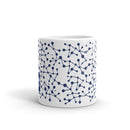 mug with blue abstract network pattern against a white background