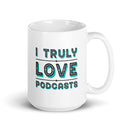 White mug with blue and aqua text saying 'I TRULY LOVE PODCASTS' in bold font.